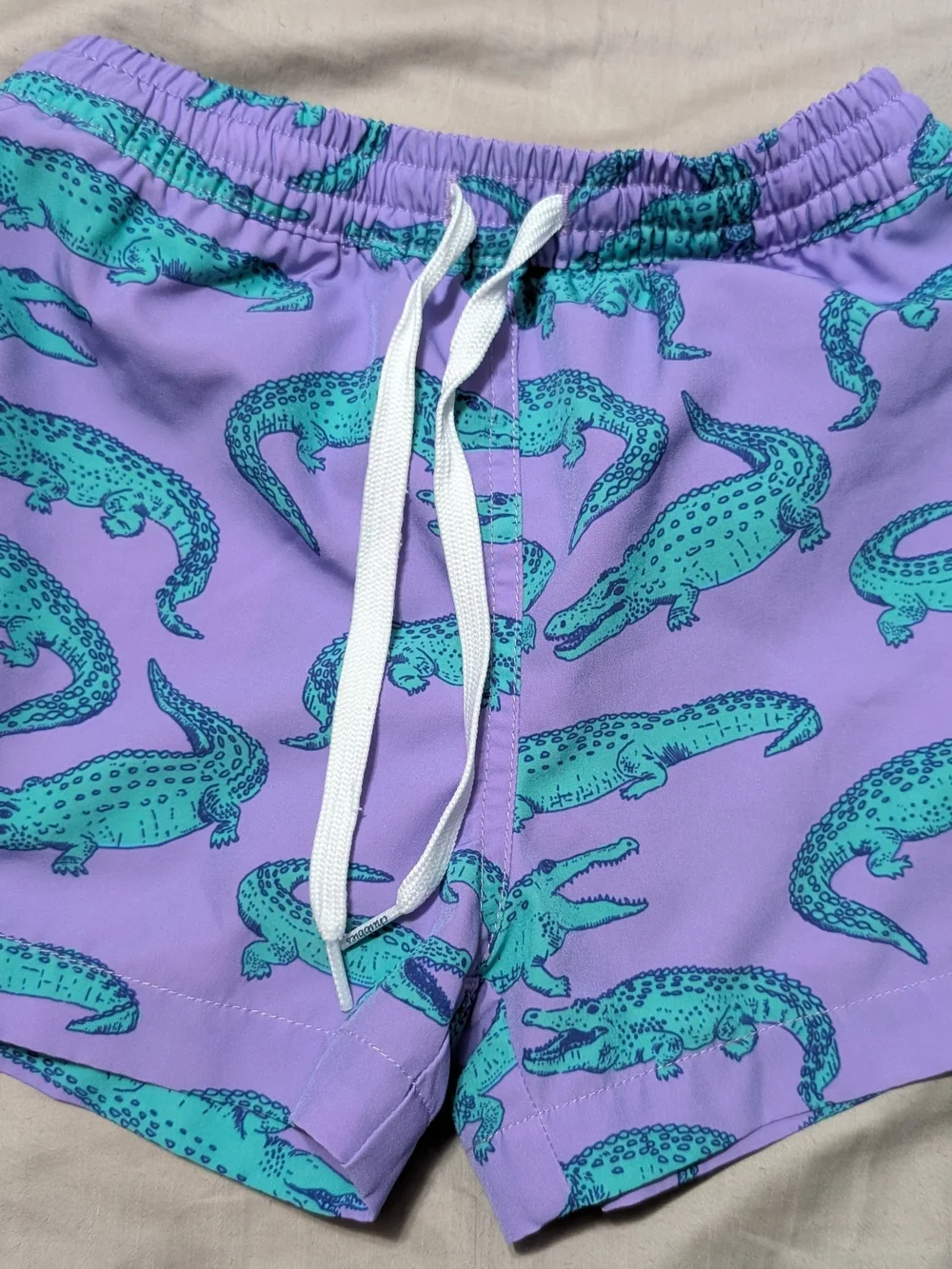 Kids Purple Alligator Print Swim Trunks